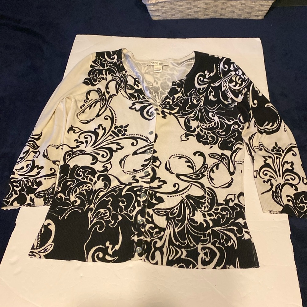 White House Black Market size small. Black and white sweater.